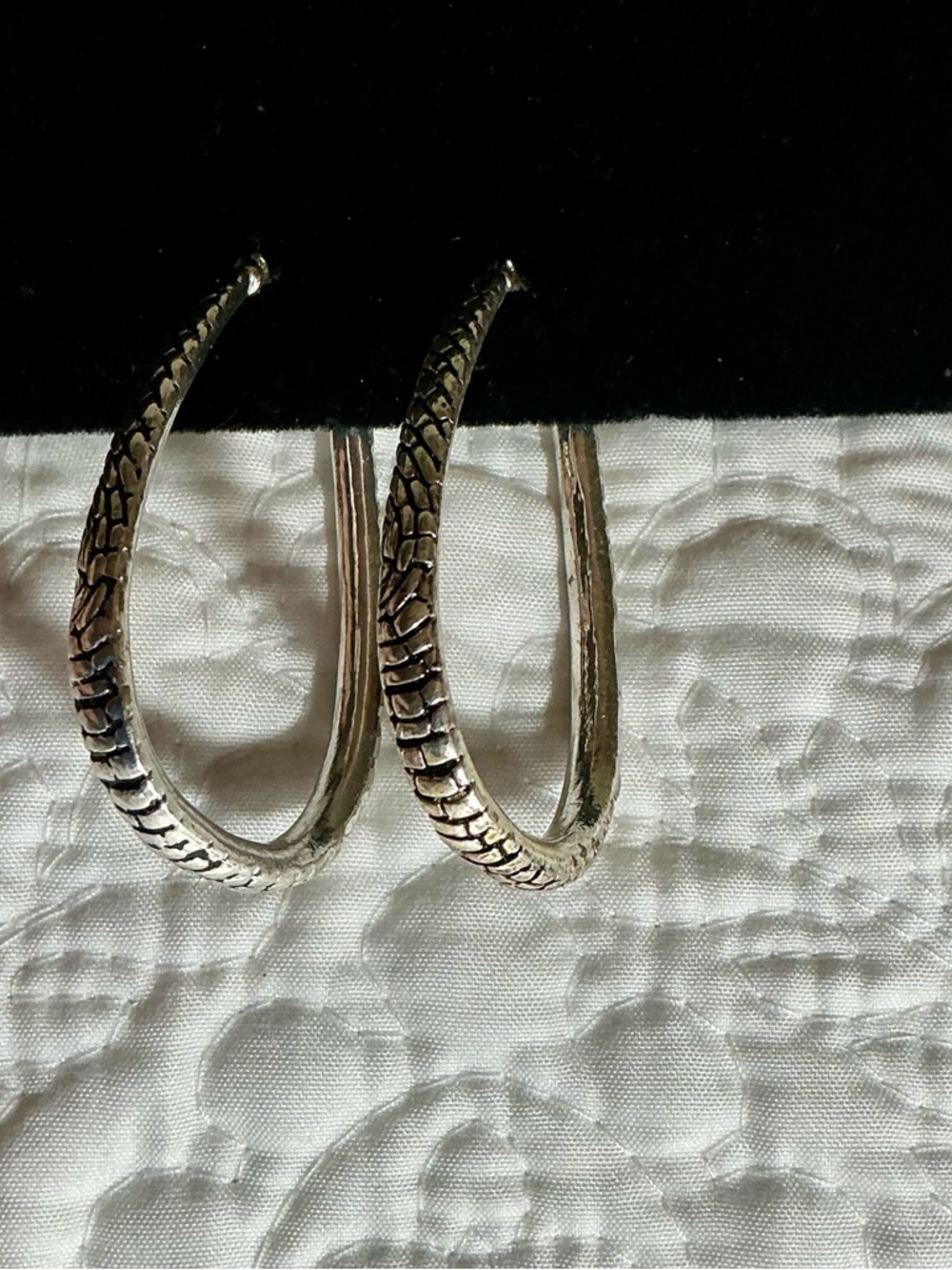 Silver-Tone Textured Hoop pear shaped clicker close  Earrings -